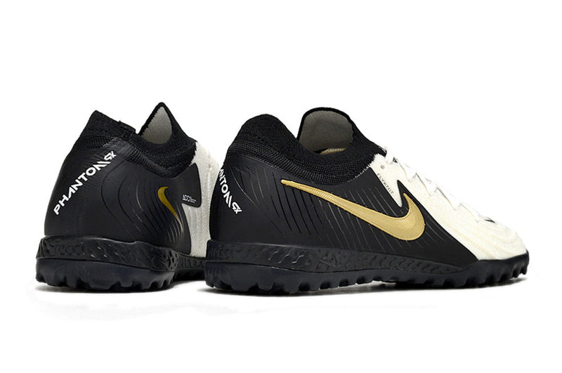 Chuteira Society Nike Phantom GX 2 Elite TF Preta, Branca e Dourada "Mad Ready Pack"