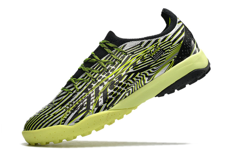 Chuteira Society Puma Ultra Ultimate 1.4 TF Preta e Verde "Teaser"